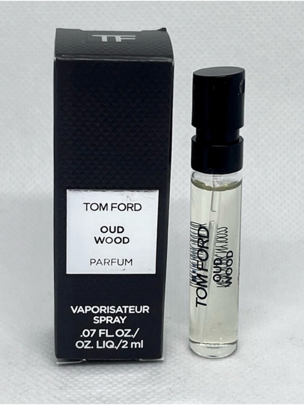 Tom Ford Black and Clear Oud Wood Bottle Image